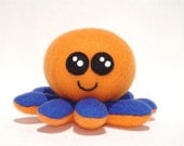 Plush baby octopus toy made with orange and blue fleece