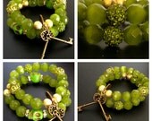Antique-inspired cat eye and howlite turquoise stone bead bracelet with bronze plated key charms and skull accents