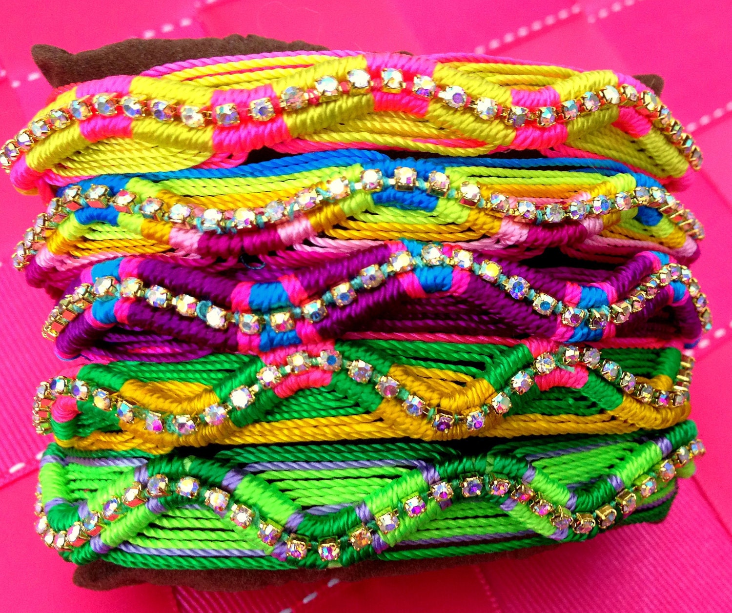 Neon, handwoven diamante friendship bracelets embellished with aurora borealis crystal chain.