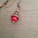 Red Natural coral earrings in copper