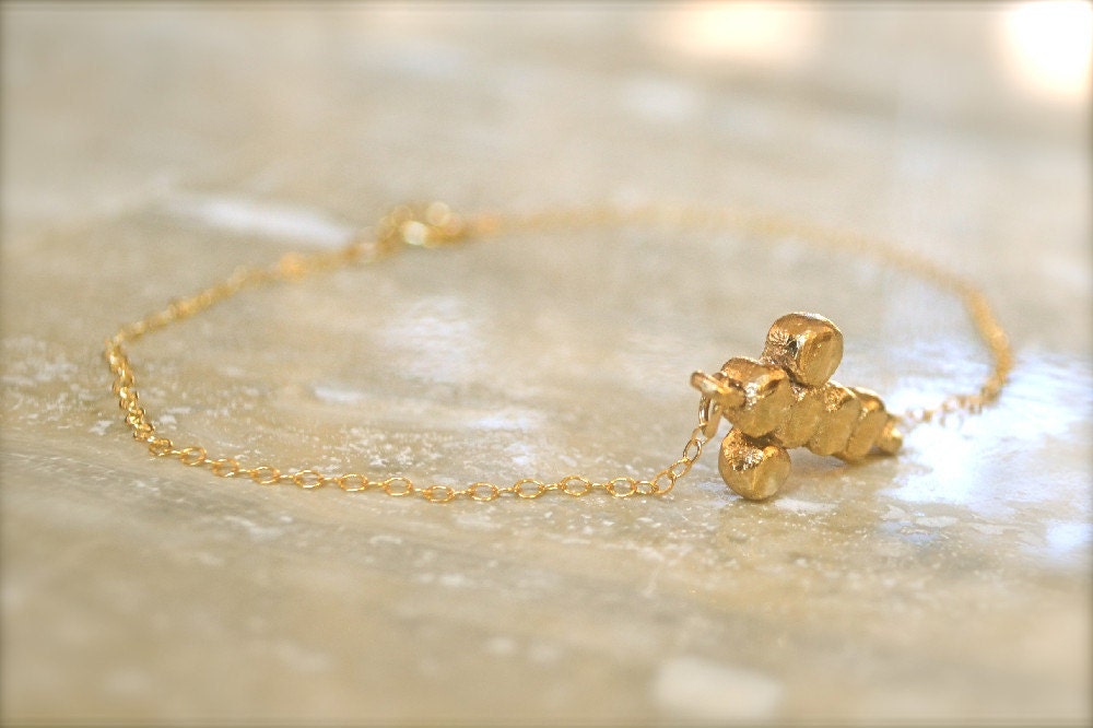 Gold Sideways Cross Bracelet