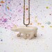 Polar bear pendant. White porcelain necklace.