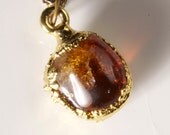 Truly unique amber pendant necklace.