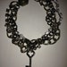 Metal Bracelet with Diamonds and Skeleton Key Charm