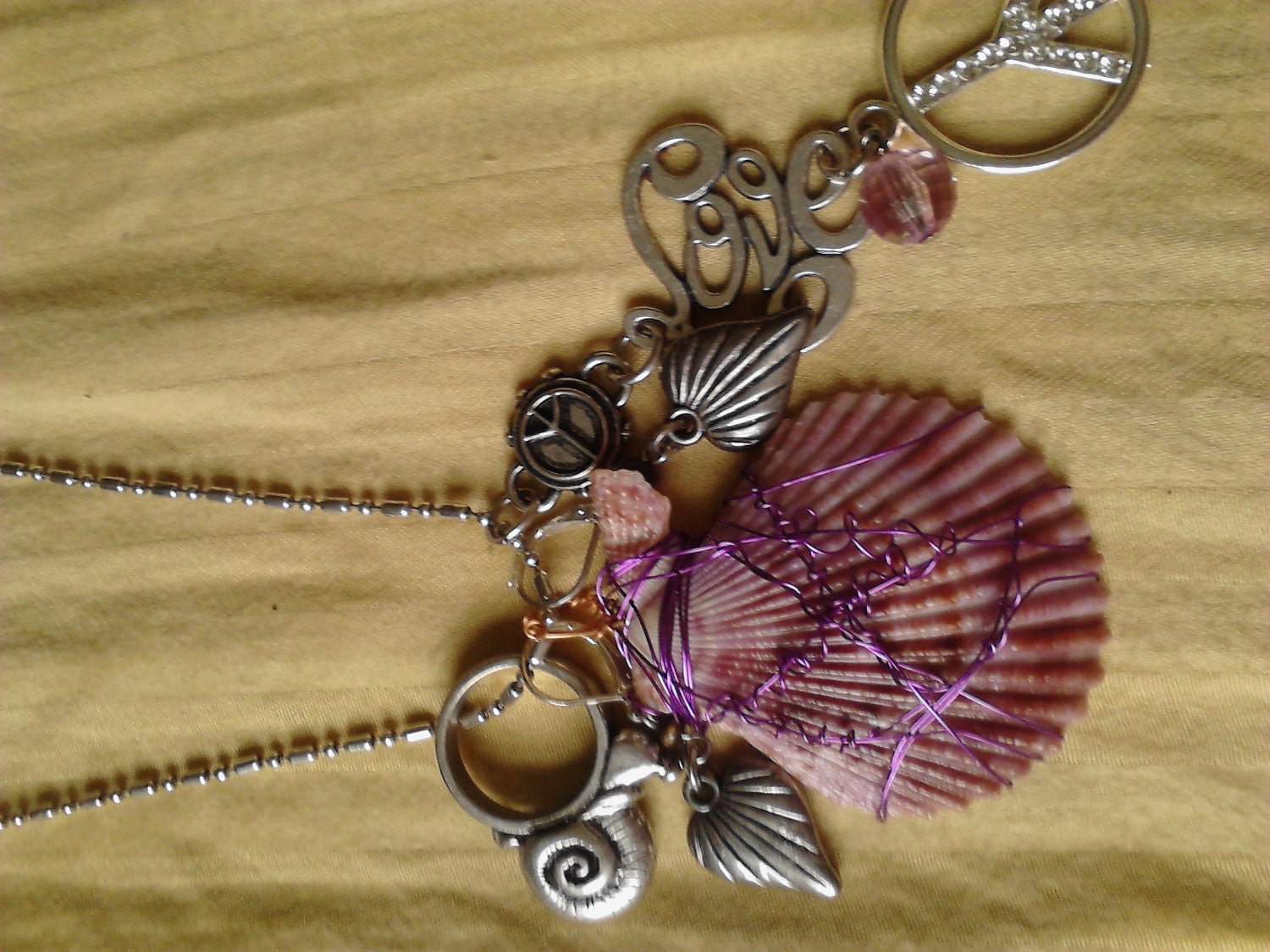 Wire wrapped purple seashell necklace - FromUnderTheTree