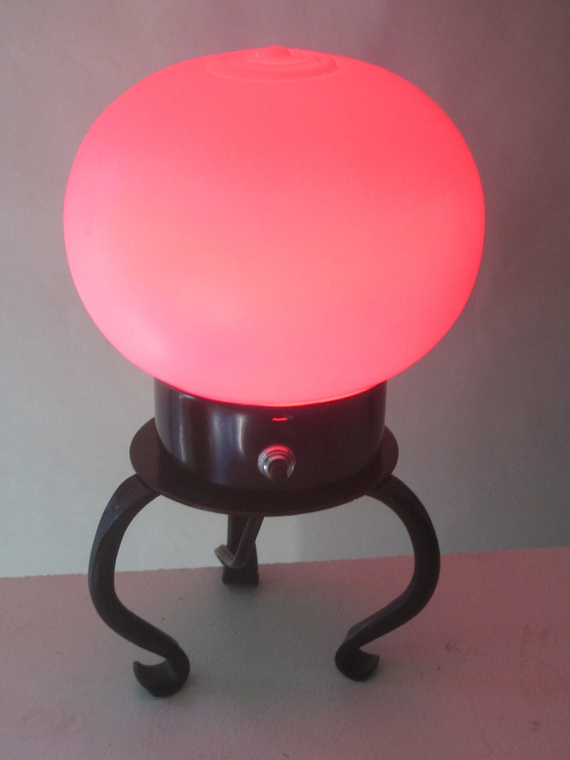 Homemade upcycled glass globe UFO lamp for beautiful mood lighting.
