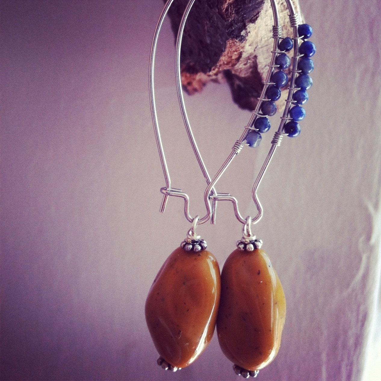 wire wrapped with lapis lazuli with dangling mustard/yellow vintage lucite nugget