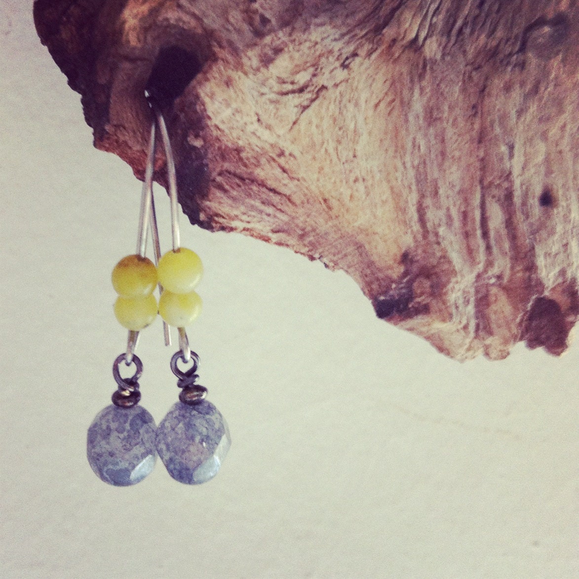 small kidney shape earrings with olive jade and dangling grey fire polished czech glass bead