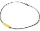 Grey Leather Cord Necklace with Yellow Floral Fabric Bead