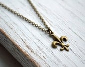 Little fleur de lis Necklace with Antique Brass Chain. Simple, Dainty, Petite