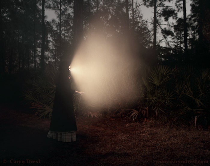 A Light To Guide You Home - FREE SHIPPING Print Girl Night Dark Lighthouse Black Warm Glow Woods Forest Trees Fog Orange Yellow Green Brown
