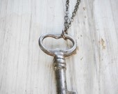 simple little secret necklace. antique cabinet key on oxidized sterling silver by val b.