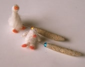 two miniature felting needles