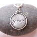 Hand stamped silver disc with rim by Under Her Charm