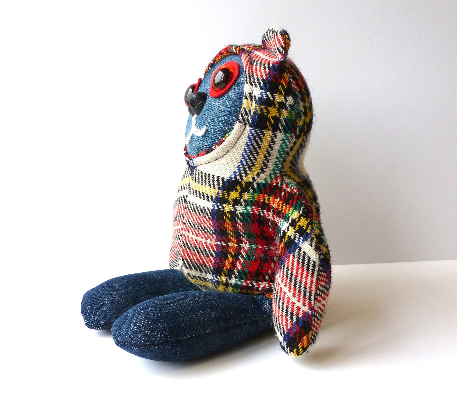 Sitting Bear Wearing Tartan Hoodie