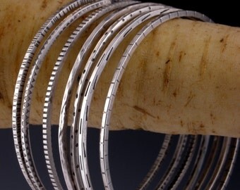 a gaggle of bangles                        bracelet in recycled sterling silver