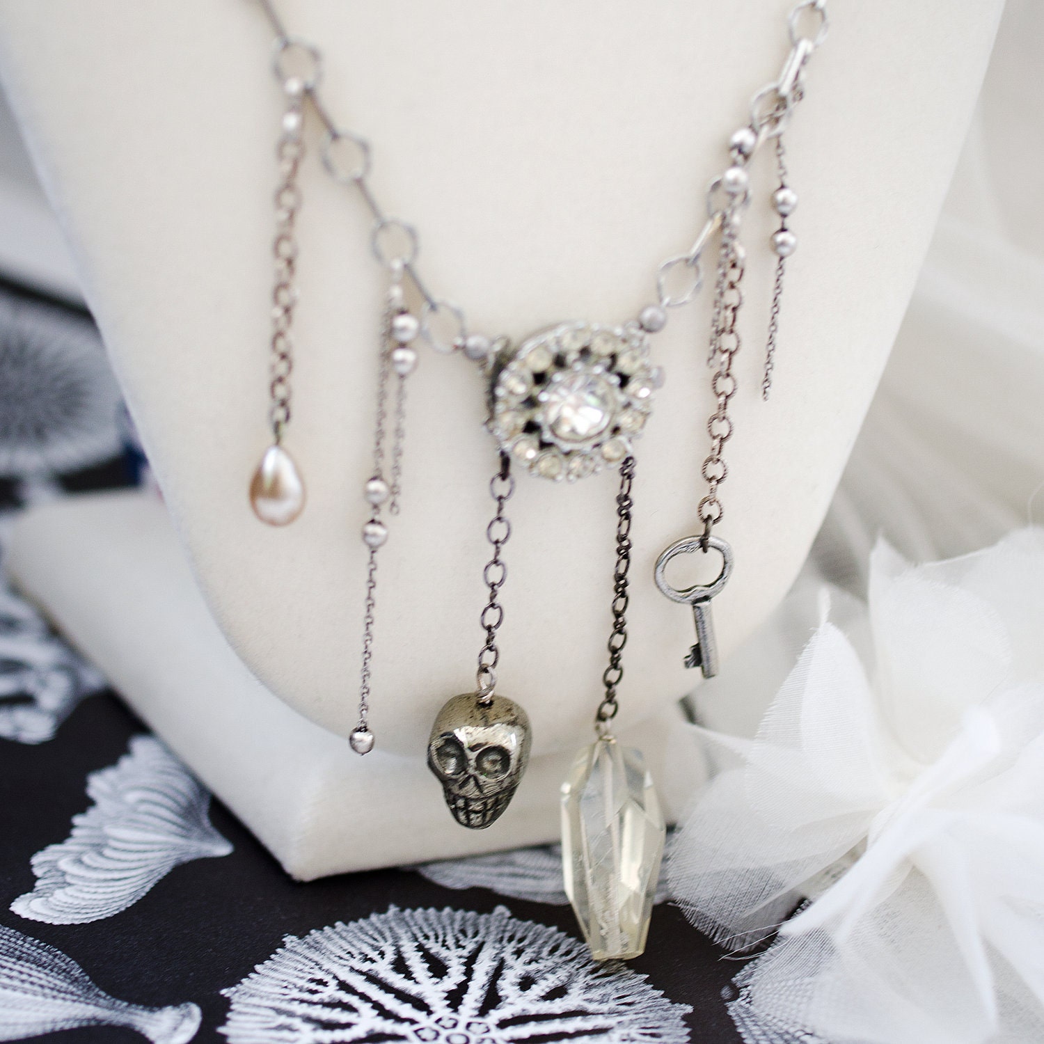 cabinet of curiosities necklace. with vintage rhinestone centerpiece punk steampunk skull