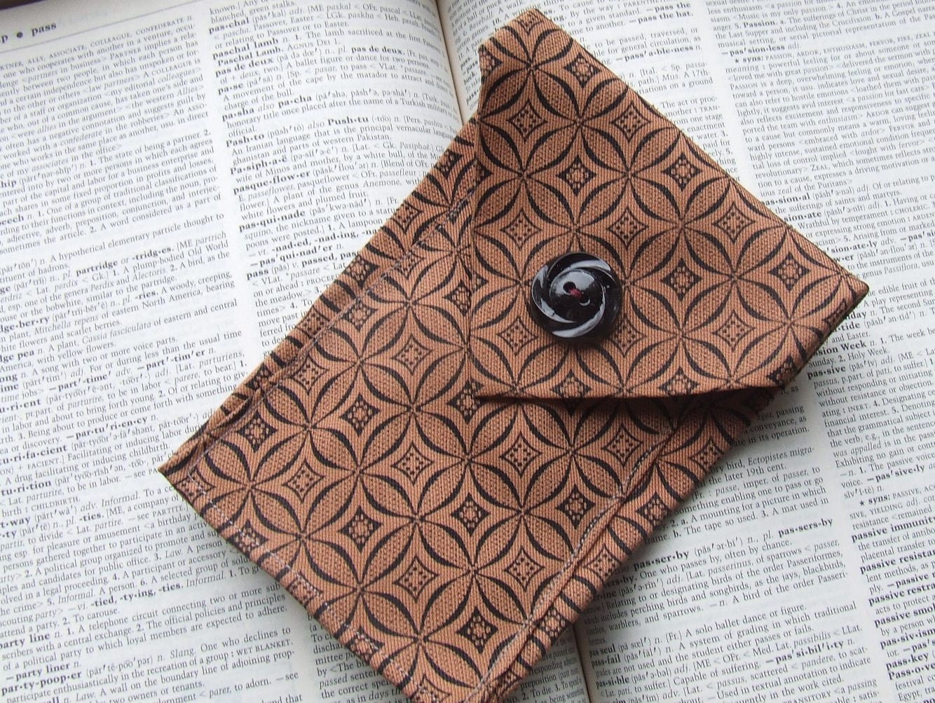 phone case fashioned from black and sunset brown vintage tie