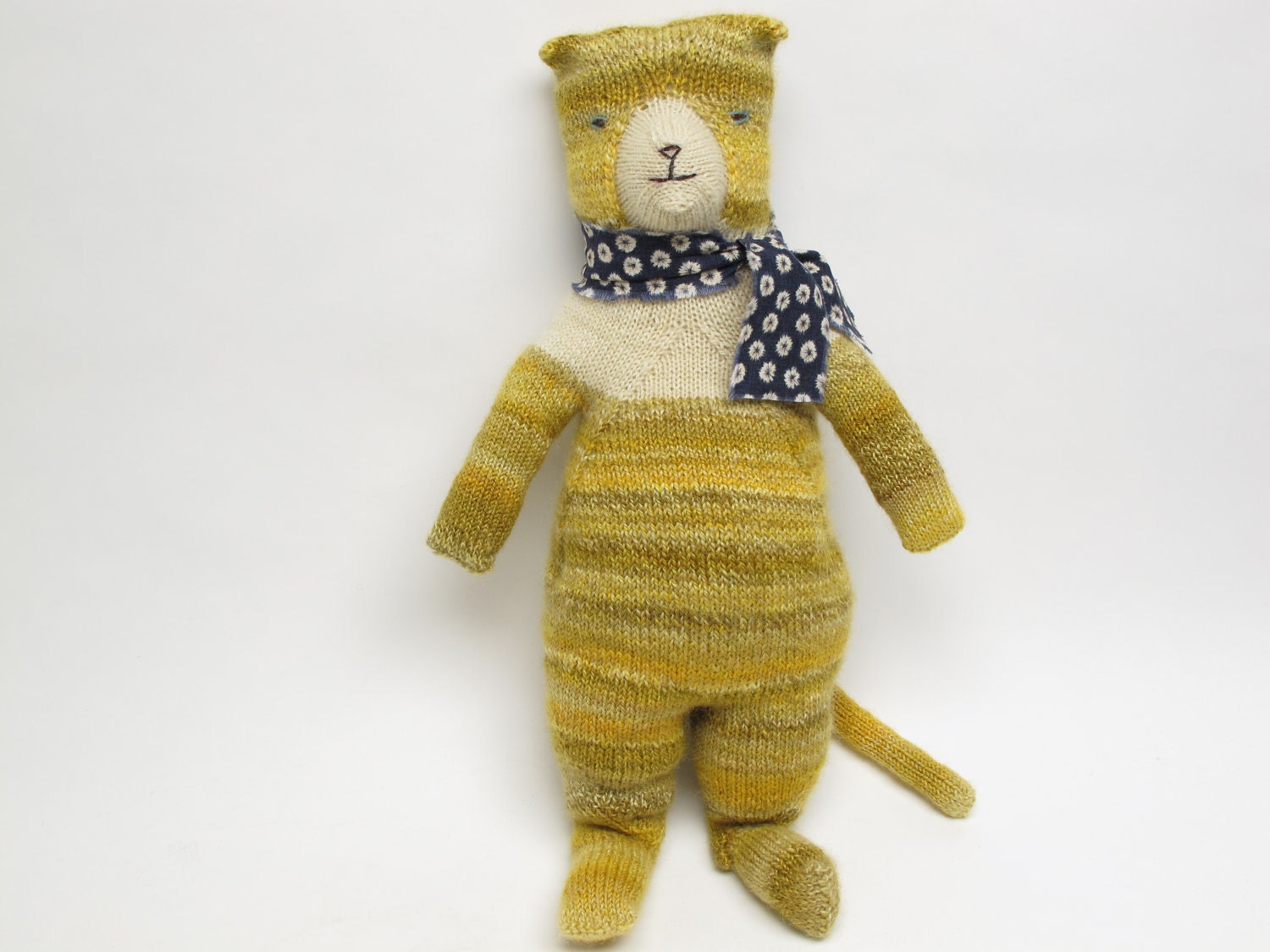 Popcorn The Cat, a hand knit cat doll