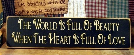 The world is full of beauty when the heart is full of love primitive sign