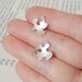 sterling silver petal ear studs, handmade in UK