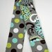Reversible Camera Strap Cover - includes padding and lens cap pocket - Lime Garden Dot