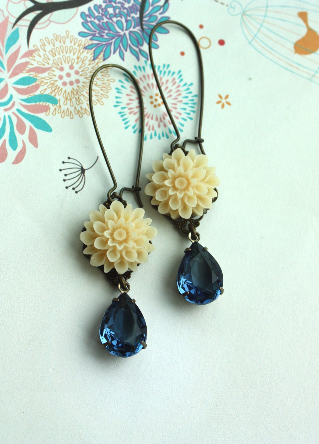 An Ivory Chrysanthemum Flower Dark Navy Blue Pear by Marolsha