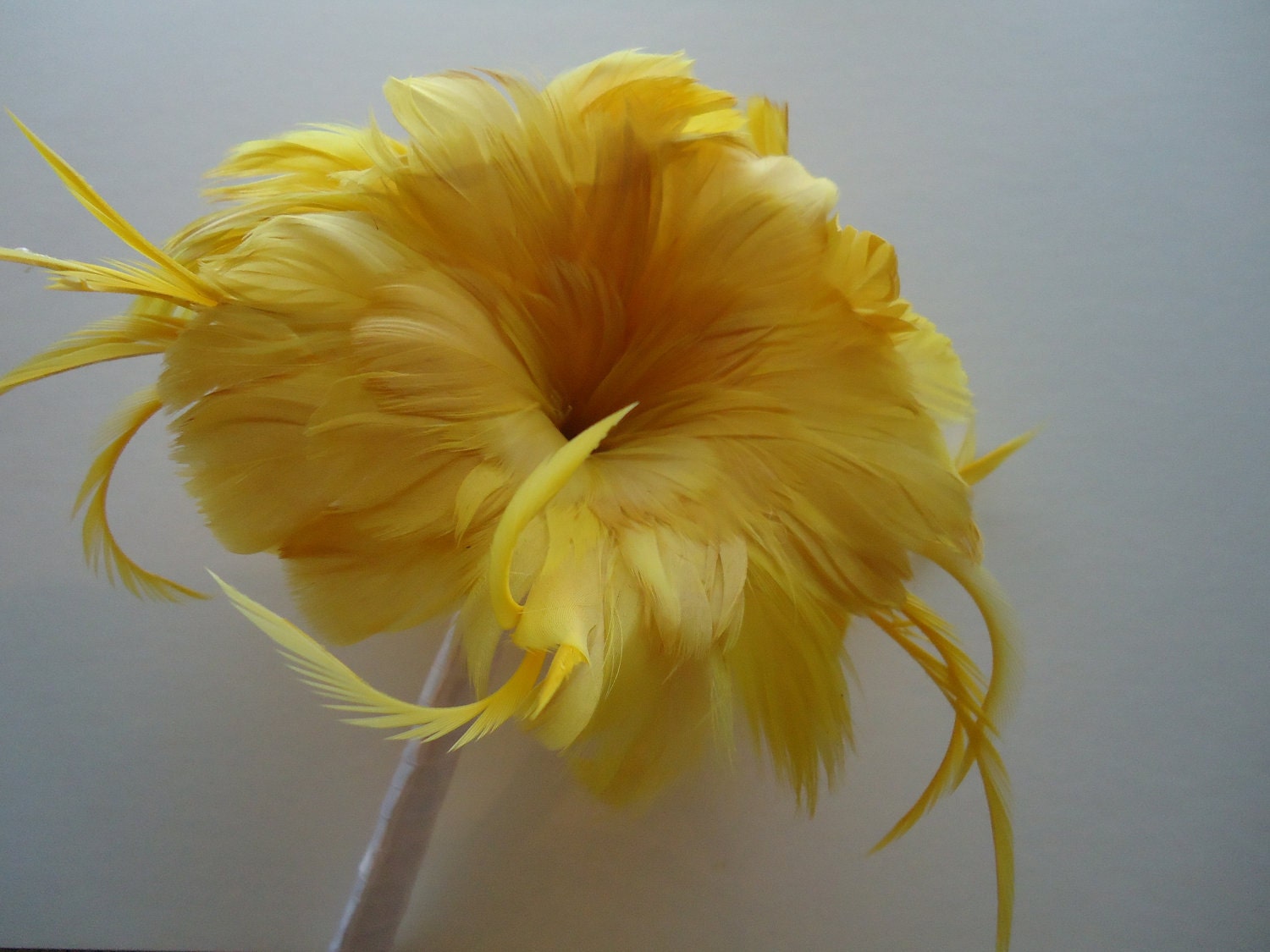 Weddings bridesmaids bouquet mustard yellow feathers by eeek
