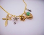 Gold charm necklace. Heart, music, pearl, cross. Umbrella, treble clef, flower. OOAK gift. Vintage, upcycled and new charms.