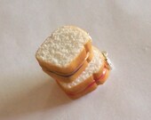 grape or strawberry peanut butter and jelly sandwich charm