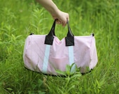 The Overnighter, a pink duffle bag