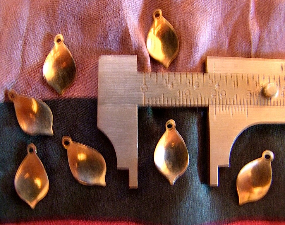 36 Vintage brass charms,nos 1960s 70s