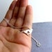 Sterling silver bird and heart necklace. Valentines Day love pendant