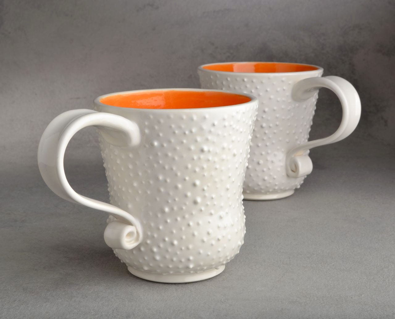 Dottie Mugs: MADE TO ORDER Two White With Orange Interiors by Symmetrical Pottery