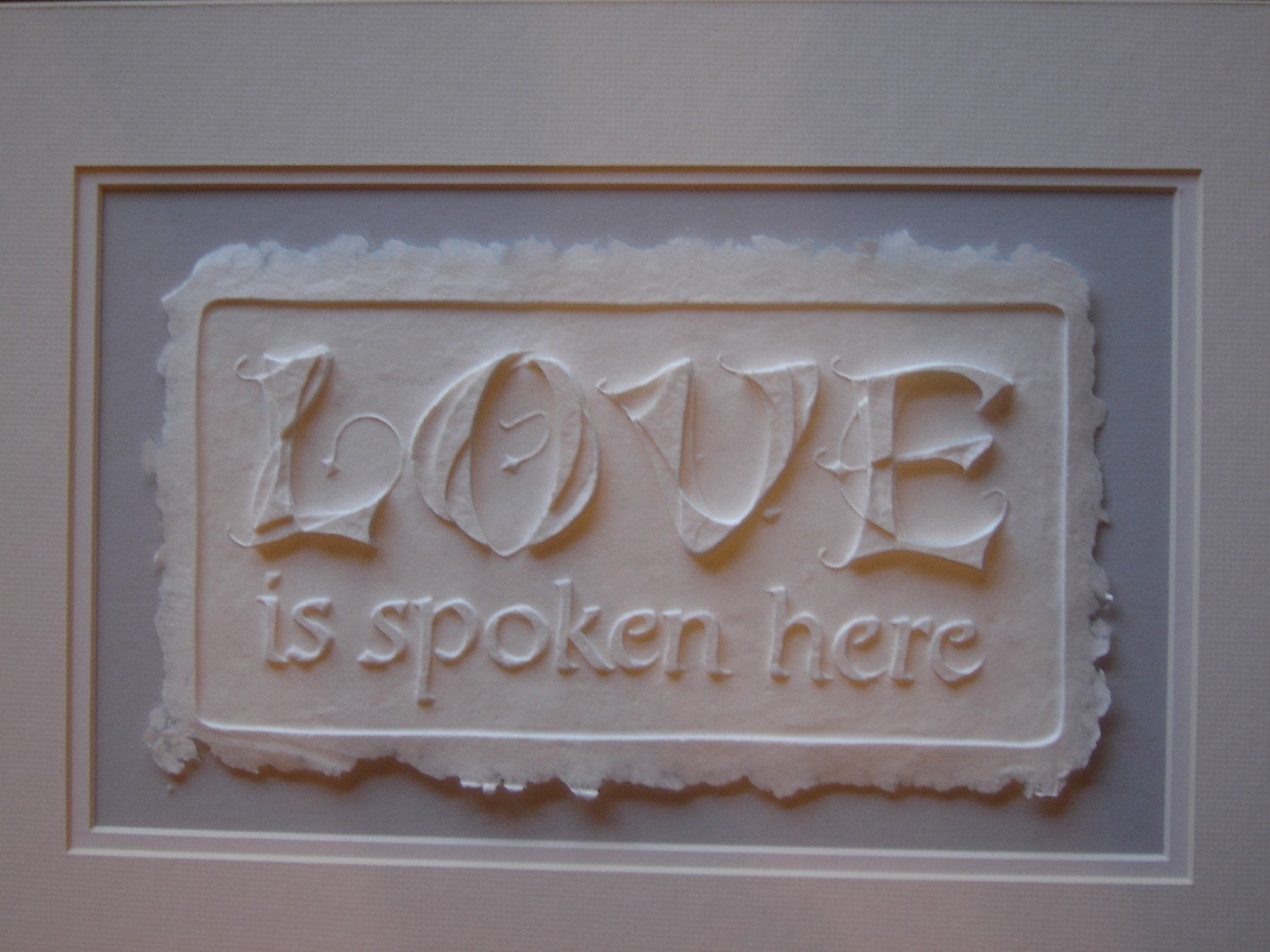 Love is Spoken Here elegant casting for your wall