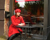 Womens cherry red fleece swing coat. Embellished with gorgeous red roses.