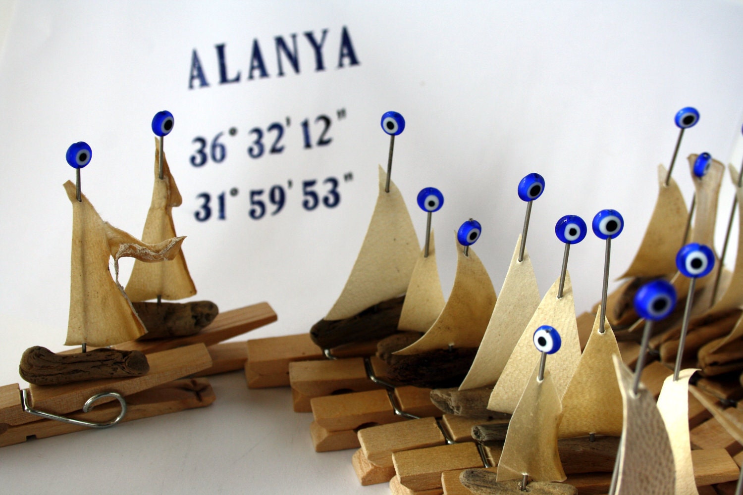 3 driftwood boats "peg-sail " with a sail from genuine parchment on a clothespin and "evil eye" glassbead...woodland