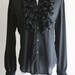simple sheer black button up with detailed ruffle collar and sleeve hems- on sale