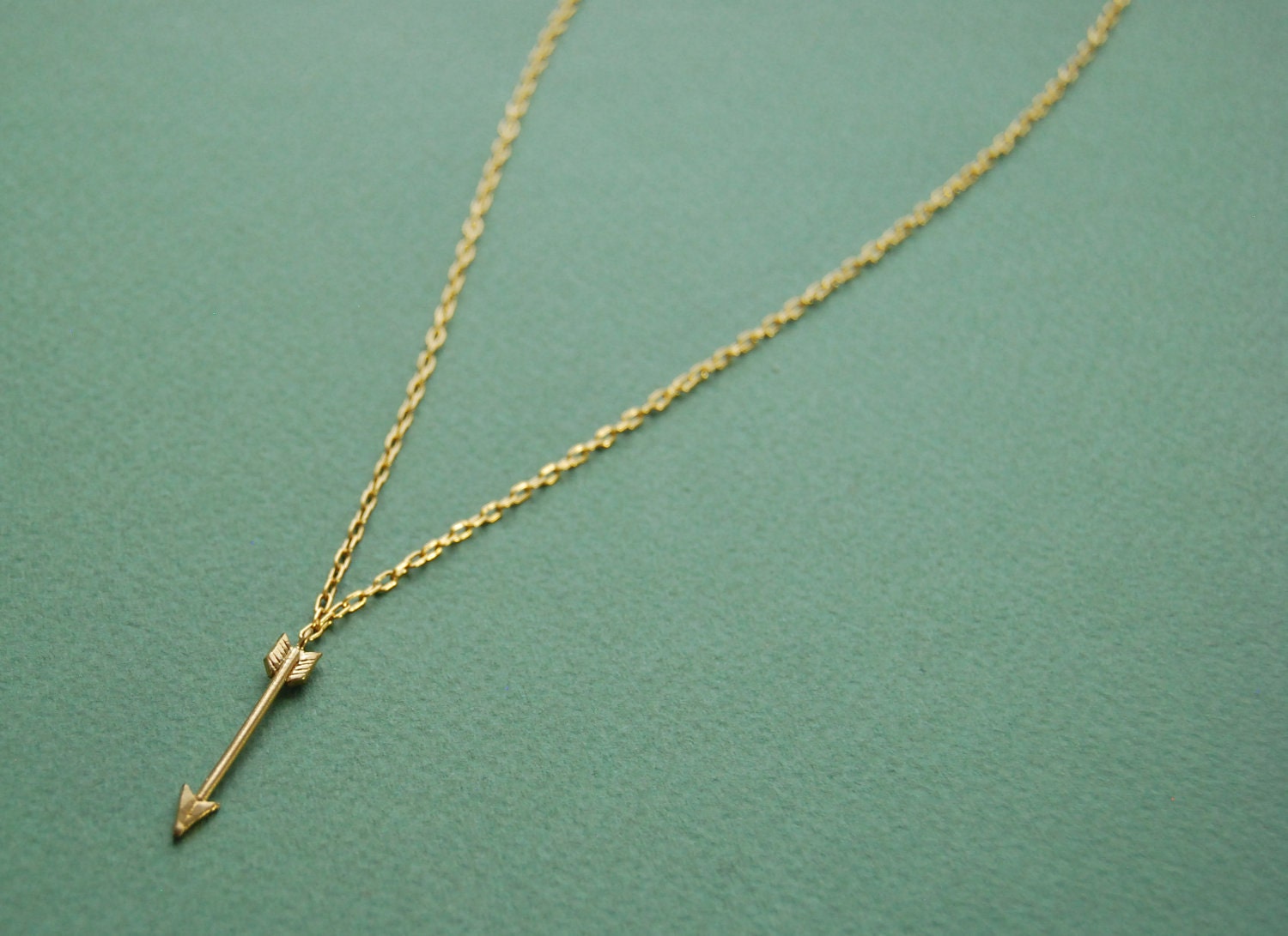 Tiny golden arrow necklace