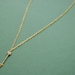 Tiny golden arrow necklace
