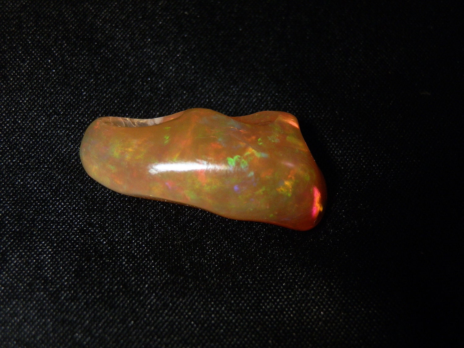 Reserved... Mexcan Fire Jelly Opal top grade free form cabochon. 24cts. 30x15x11mm