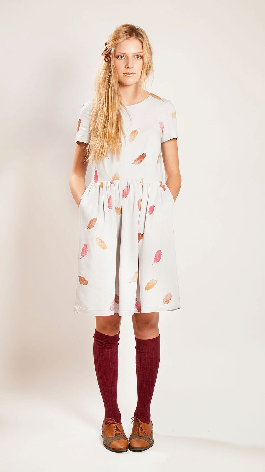 The 'Falling Leaves'  hand printed bamboo sateen dress with sleeves, gathered skirt, and hip pockets
