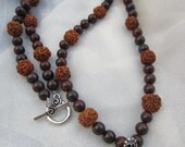 Goddess Tara rosary necklace of rudraksha seeds and brecciated jasper