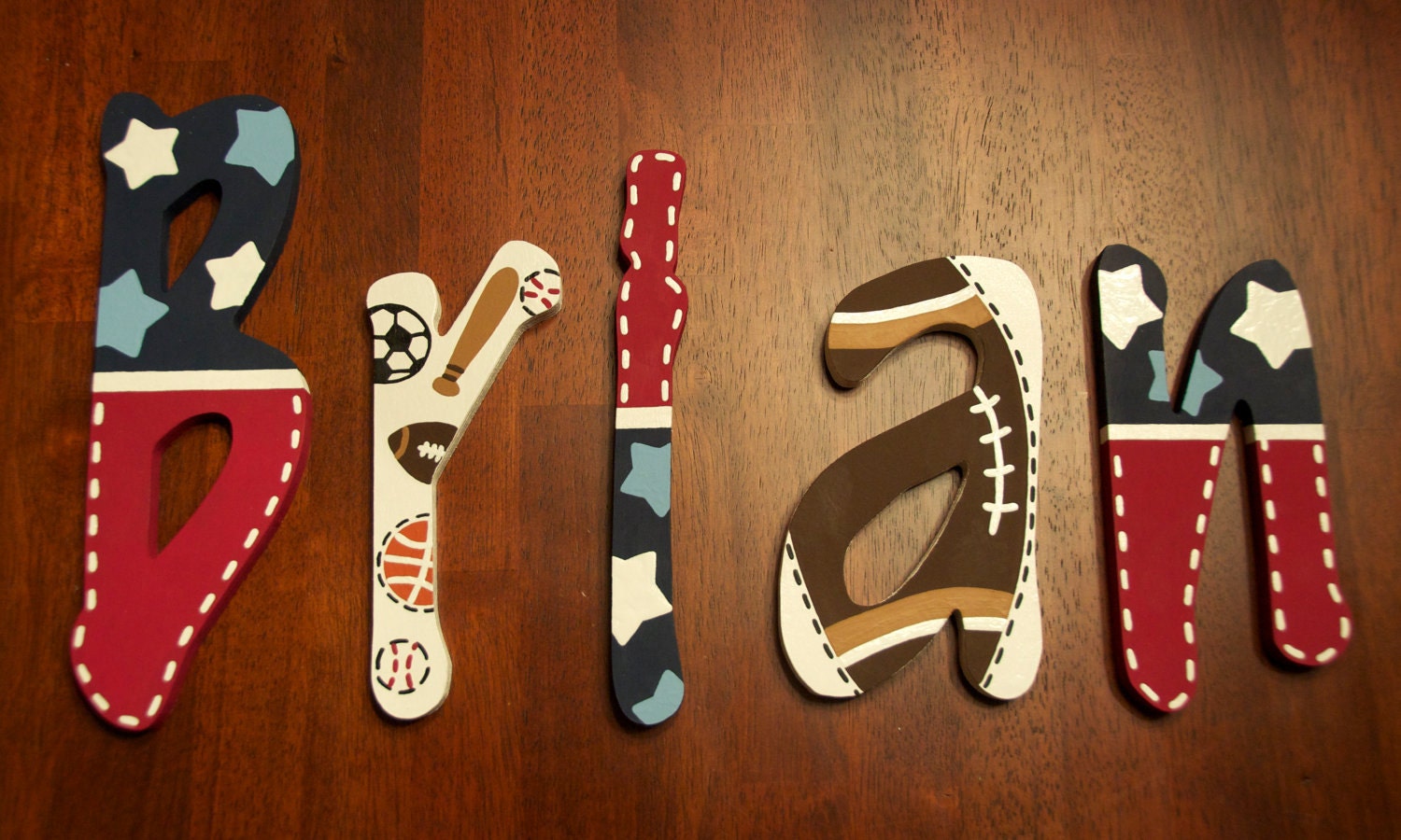 Items similar to Wooden nursery letters, sports theme on Etsy