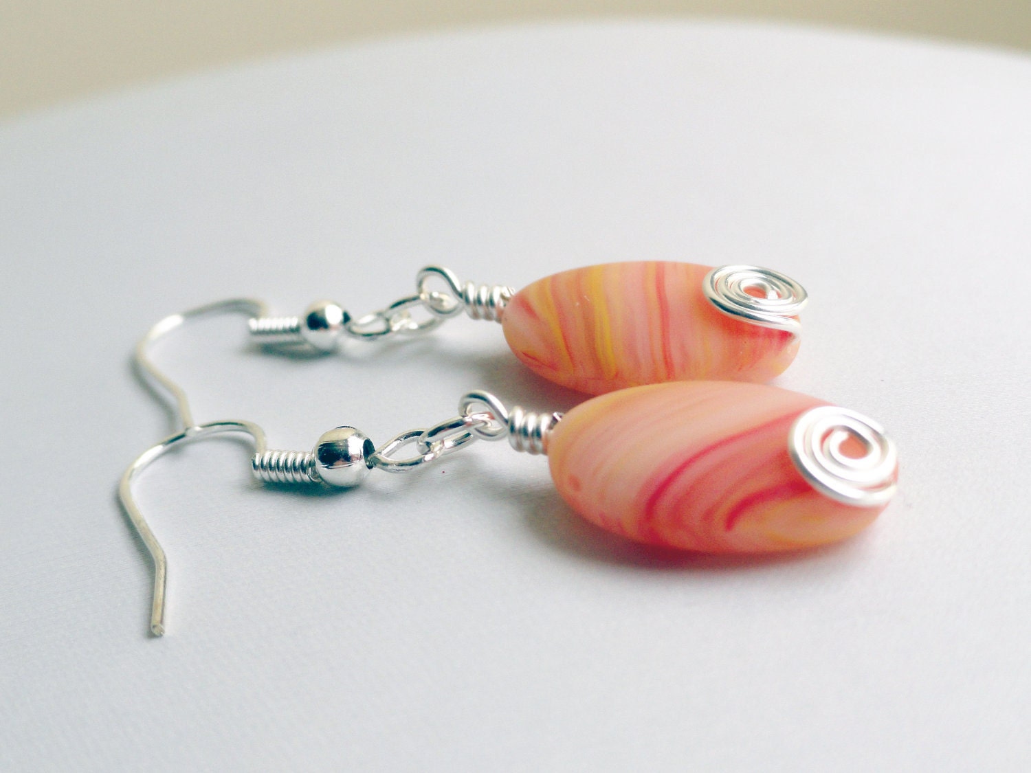 Orange earrings - orange oval earrings - spiral earrings - silver spiral - peach earrings - beaded earrings - orange zest earrings
