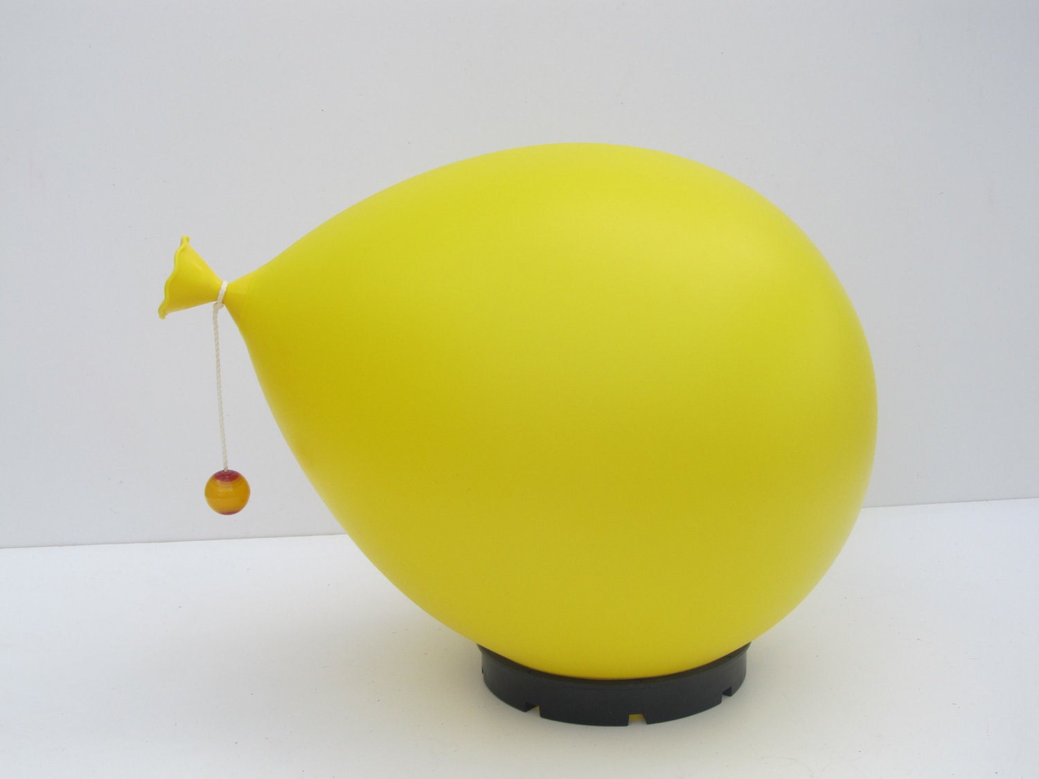 Balloon lamp designed by Yves Christin for Bilumen table or wall/ceiling light, Italy 1970s diffuser of blown plastic and black ABS base