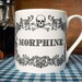 The New Apothecary Morphine Cup. Coffee mug, tea cup, coffee cup with skull illustration.