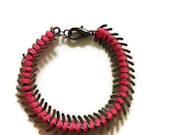 Gunmetal fish tail chain wrapped in pink thread