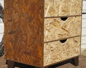 modular OSB brown dresser with black scoop pulls