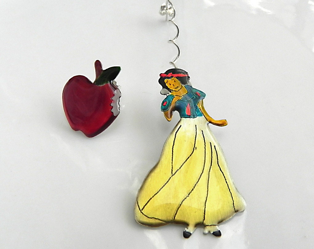 Snow white and the bitten apple hand cut metal earrings. Sterling silver hangers.
